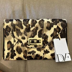 NWT DVF Agent Clutch Leo Snake.  Vintage Leopard Natural.  (Description on tag)